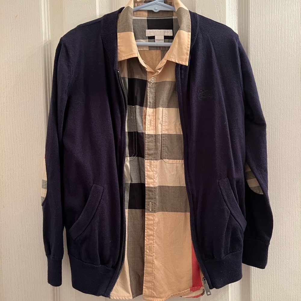 Blue elbow patch burberry sweater. Burberry Button down shirt not included.
